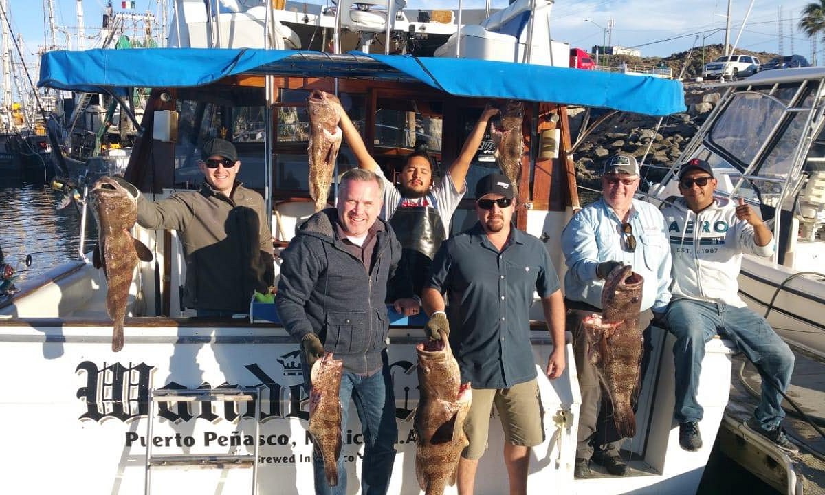 Rocky Point Fishing Club crew and guests with their catches aboard WanderLust